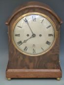 A late 19th / 20thC bracket clock in burr walnut and oak case,