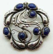 A silver brooch set with lapis lazuli by Jenson and Wendel,