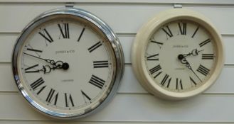 Two Jones & Co quartz dial wall clocks with Roman numerals,