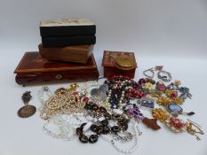 A collection of jewellery including beaded necklaces, marcasite, white metal coins and necklace,
