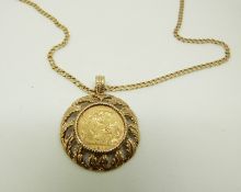 A 9ct gold necklace/ pendant set with a 1910 half gold sovereign on a 9ct gold chain,