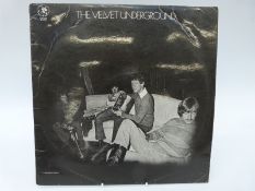 The Velvet Underground (MGM CS 8108) vinyl appears only good,