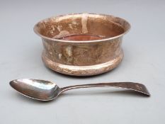 A modern feature hallmarked silver wine coaster, diameter 11.