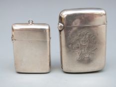 Two Victorian hallmarked silver vesta cases, both Birmingham 1899, one maker George Unite 56mm tall,