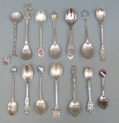 Nine white metal and hallmarked silver collector's spoons 98g,