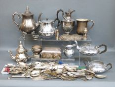 A collection of silver plated items including tea sets, cutlery, tankard,