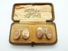 A pair of 9ct gold cufflinks in Oxford St, London box, 2.