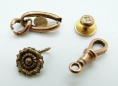 A 15ct gold stud set with a diamond (1.