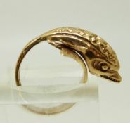 A 9ct gold ring in the form of a dolphin, size K 5.