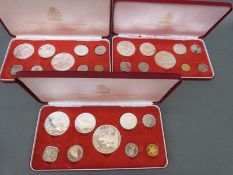 Three cased proof coin sets all Commonwealth of the Bahamas