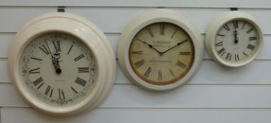 Three quartz dial wall clocks in various sizes, one 'D Silver' to dial,