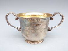 Modern hallmarked silver loving cup with gilt wash interior, width 13.