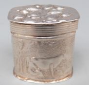 Dutch white metal pillbox with embossed scene, Dutch silver marks for 1887, height 32mm,
