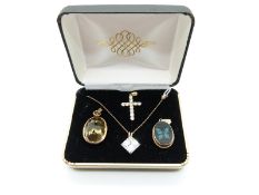 A 9ct gold pendant set with opal in a butterfly design, a Victorian pendant set with a citrine,