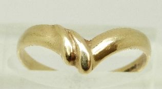 A 9ct gold ring in a V shape, size L, 1.