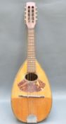 Russian made 1970s bowl back mandolin, with faux tortoiseshell fingerboard,