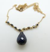 A 9ct gold necklace set with a briolette cut sapphire and eight round cut sapphires to the chain, 4.