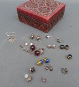 A collection of earrings including lapis lazuli, silver,