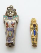 A white metal Egyptian sarcophagus marked 800 set with enamel