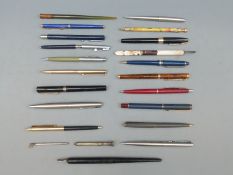 A collection of pens including Parker and Osmiroid