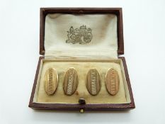 A pair of 9ct gold cufflinks with engine turned design, in original box, 3.