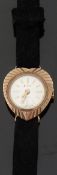 Accurist 9ct gold ladies wristwatch with heart shaped bevelled case, gold hands and baton numerals,