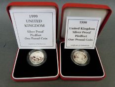 Two UK silver proof Piedfort one pound coins,