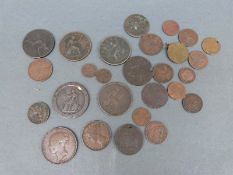 A vintage tobacco tin containing a small collection of largely 19thC copper coins
