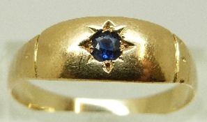 A late Victorian ring set with a sapphire in a star setting, size O, 2.