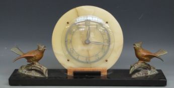 British Art Deco style mantel clock on black marble base, with birds to either side,