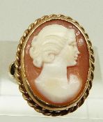 A 9ct gold ring set with a cameo, size K, 4.