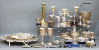 A collection of silver plate including platters, goblets, trophies,