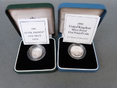 1990 5 pence Royal Mint silver proof piedfort coin together with a 1993 silver proof £1 coin,
