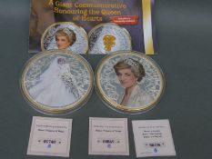 Two ultra large silver and gold plated ten pence pieces commemorating Princess Diana,