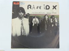 Two European punk singles Intoxication - Rancid X Italian pic cover with writing and Die Autos -