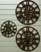 Three wrought iron effect garden / patio clocks with faux visible movements,