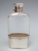 George V hallmarked silver and tortoiseshell hip flask with cut glass bottle and pique work