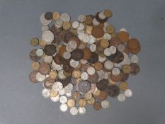 A quantity of largely UK pre-decimal coinage with pre 1947 silver content and a little pre 1920,