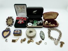 A hallmarked silver bracelet, enamel heart shaped picture frame, All Blacks cufflinks,