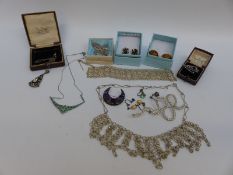 A silver clip set with marcasite, silver necklace set with paste, two vintage jewellery boxes,