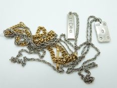 Two silver ingot pendants,