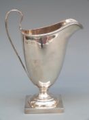 George V hallmarked silver helmet shaped cream jug of Georgian form, Chester 1921,