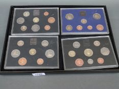 Four Royal Mint brilliant uncirculated coin sets 1982, 1984,