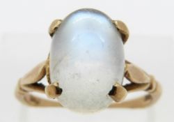A 9ct gold ring set with a moonstone cabochon, size N, 3.