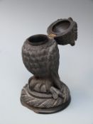 A 19thC carved bog oak owl inkwell,