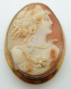 A 9ct gold brooch set with a cameo of a young woman