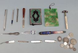 A small collection of hallmarked silver and bijouterie including a Victorian notebook with white