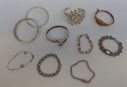 Two silver bangles, an Eastern bangle marked 800,