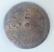 A Charles II 1668 crown, draped bust,