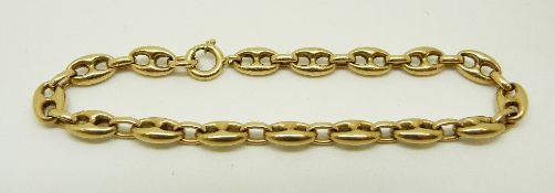 A yellow metal bracelet of pierced oval links, 12.